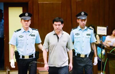 北京：“红通”落网第一人 被判14年6个月