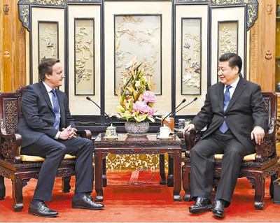 1月11日，国家主席习近平在北京钓鱼台国宾馆会见英国前首相卡梅伦。 　　新华社记者 李学仁摄 