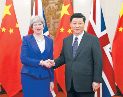 2月1日,国家主席习近平在北京钓鱼台国宾馆会见来华进行正式访问的英国首相特雷莎·梅。 新华社记者 刘卫兵摄