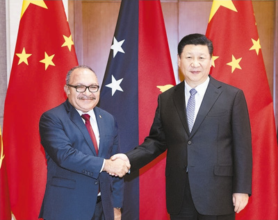 6月21日,国家主席习近平在北京钓鱼台国宾馆会见巴布亚新几内亚总理奥尼尔。 新华社记者 李学仁摄