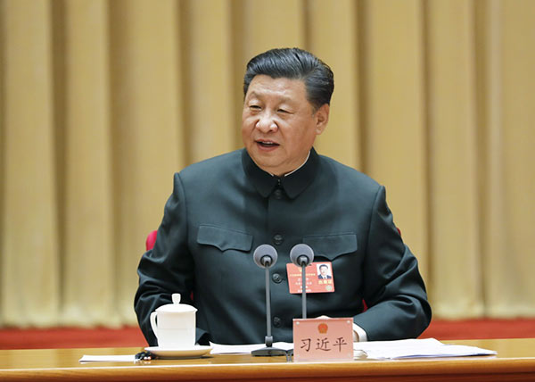 5月26日下午,中共中央总书记、国家主席、中央军委主席习近平出席十三届全国人大三次会议解放军和武警部队代表团全体会议并发表重要讲话。新华社记者 李刚 摄