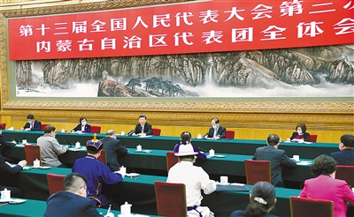 5月22日,中共中央总书记、国家主席、中央军委主席习近平参加十三届全国人大三次会议内蒙古代表团的审议。 新华社记者 谢环驰 摄