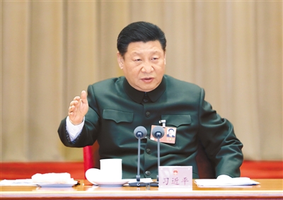 三月十二日上午,中共中央总书记、国家主席、中央军委主席习近平出席十三届全国人大一次会议解放军和武警部队代表团全体会议并发表重要讲话。 新华社记者 李 刚摄